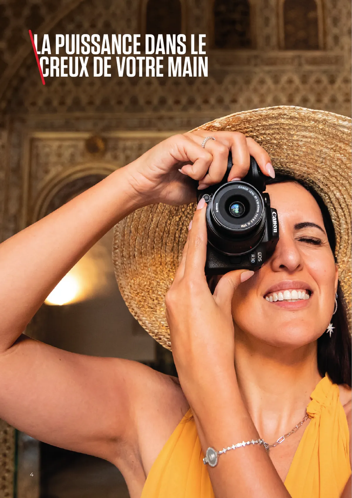 Brochure spread headed La puissance dans le creux de votre main, a full-bleed photograph of a woman in a wide straw hat shooting with a compact EOS body